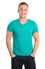 Fototapeta premium Lachender junger sportlicher Mann in Shirt grün freigestellt