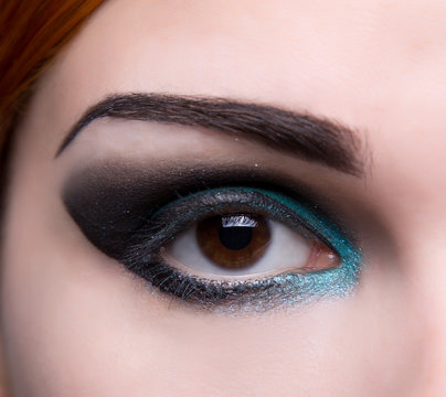 Close-up shot of an eye with artistic makeup