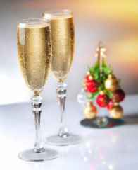 Champagne glasses and Christmas tree