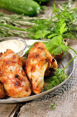 Fried chicken wings with sauce