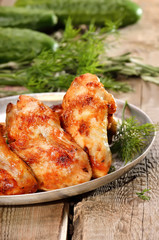 Fried chicken wings on wooden table