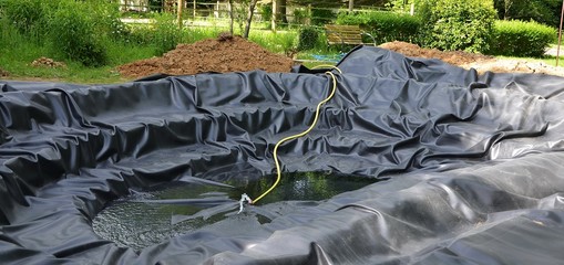 Construction d'un bassin de jardin - 72265597
