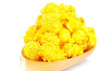 Cheese flavored popcorn on the white background
