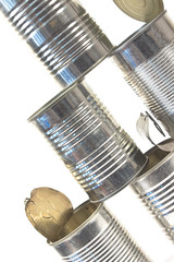 Pile of used cans over white background