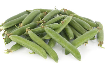 Fresh green peas isolated on a white background
