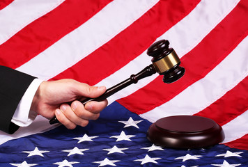 Gavel on Judge Hand over American Flag