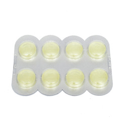 cough drops in a blister pack on a white background