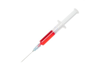 Fototapeta premium syringe with red liquid on an isolated white background