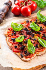 homemade olive - tomato pizza