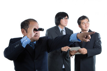 Businessman manager holding binoculars for check this stock