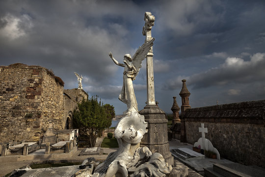 Old cemetery with alngel scultures. Comillas,Spain.