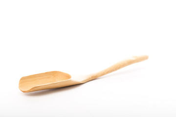 Wood spoon isolated placed