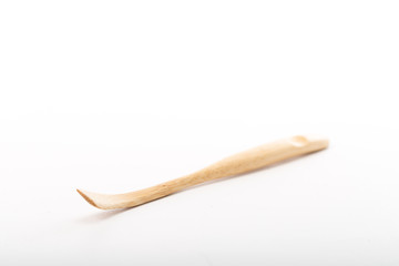 Wood spoon isolated placed