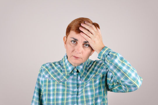 Woman Slapping Hand On Head