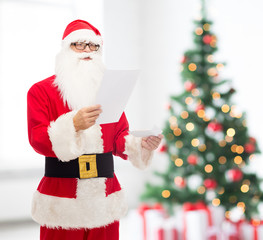 man in costume of santa claus with letter