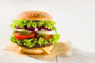 Homemade burger on the wooden table