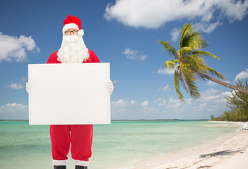 man in costume of santa claus with billboard