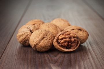 walnuts on the brown wooden table