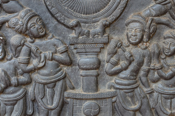 Low relief cement Thai style handcraft.