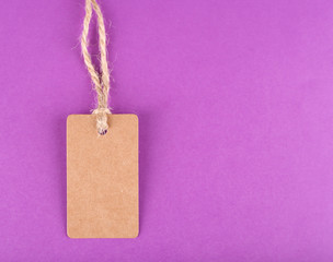 Brown tag on colorful background