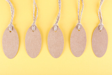 Brown tags on colorful background