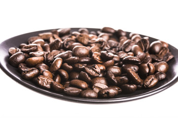 Coffee beans in the dish