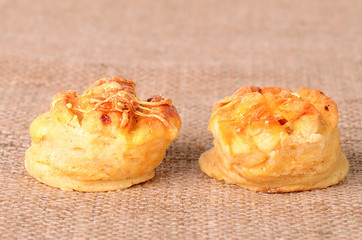 Homemade scones on sackcloth background