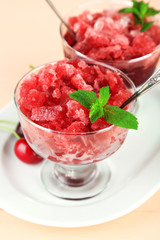 Closeup of cherry granita in glass bowl,