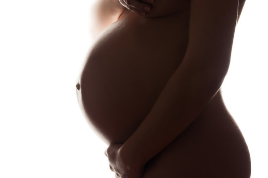 belly of a pregnant woman isolated
