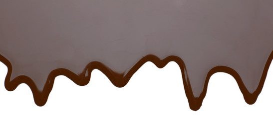 Melted chocolate dripping on white background