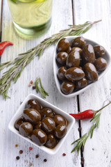 Marinated olives on table close-up