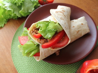 tortilla wraps with meat and vegetables