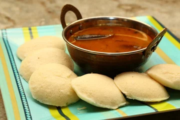 Fotobehang Idly with sambar Iddli is a traditional breakfast of South India © rakeshpicholiya