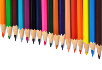Assortment of colored pencils over white