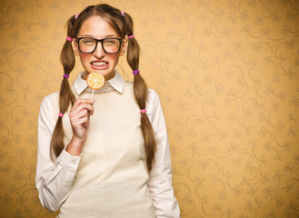 Young nerd with lollypop