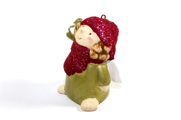 Statuette of girl with wings on a white background