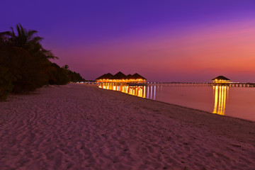 Water cafe at sunset - Maldives