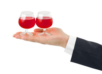 Hand and wineglasses