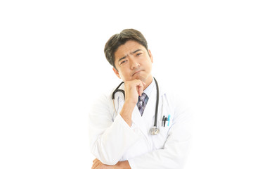 Fototapeta premium 疲れた表情の医師