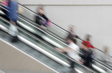 People on escalator
