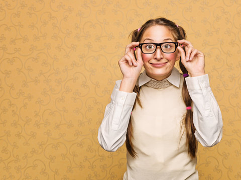 Portrait of young female nerd