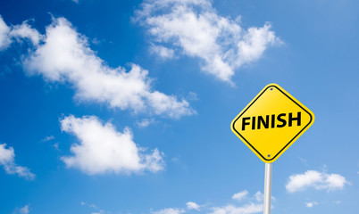 Naklejka premium finish sign on blue sky background