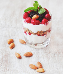 granola with cream and fresh berries