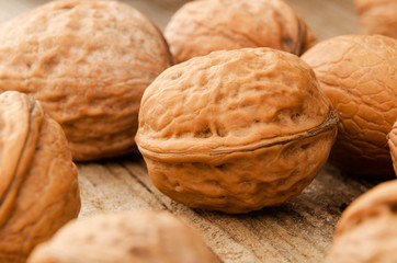 Close up of walnuts over wooden table