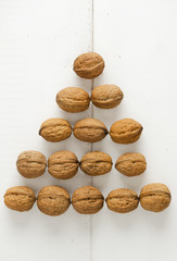 Walnuts arranged in a pyramid shape