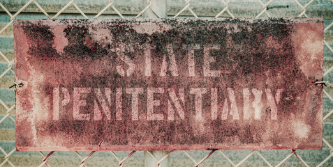 Retro Rusty Prison Sign