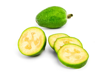 Slsed feijoa fruit, isolated on white
