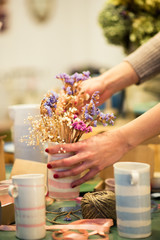 Obraz na płótnie Canvas Flowers in pottery shop