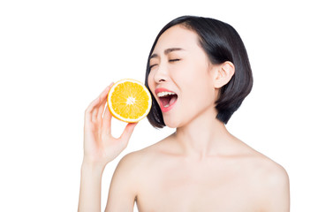 chinese woman with oranges in her hands