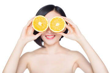 chinese woman with oranges in her hands
